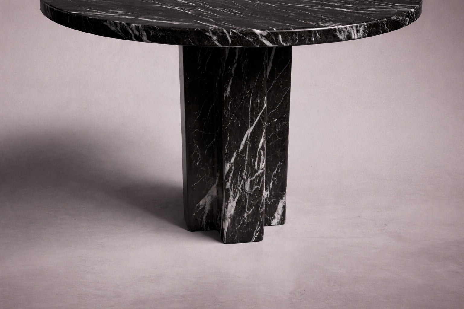 black marble round table. round black marble dining table. black marble entry table. black marble round entry table. black marble hallway table. custom marble dining table. custom marble table. custom black marble dining table.