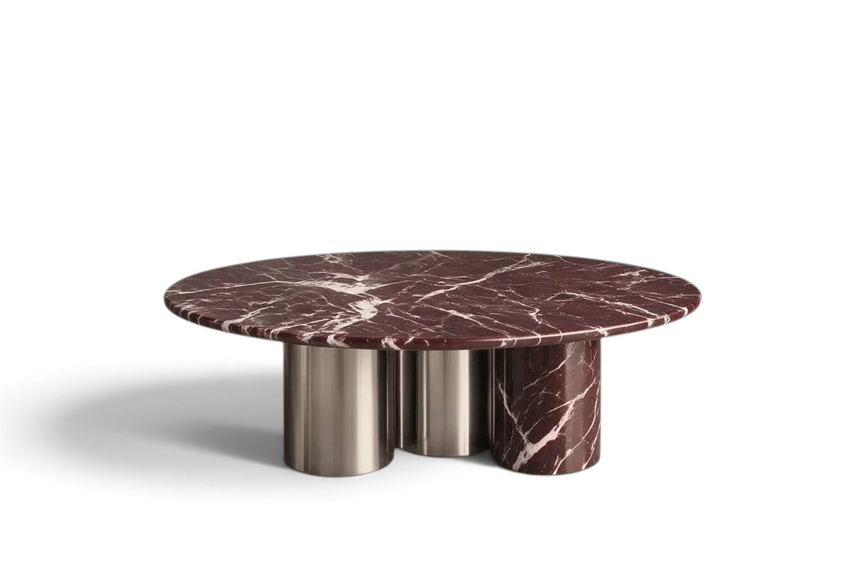 rosso levanto marble coffee table. round marble coffee table. luxury marble coffee table. designer coffee table. mixed material coffee table. sculptural coffee table. custom marble coffee table. Rosso Levanto marble round coffee table with sculptural mixed-material cylindrical legs. Luxury round coffee table in Rosso Levanto marble with sculptural base. Rosso Levanto marble coffee table for luxury interior design projects. Designer Round Marble Coffee Table in Rosso Levanto.