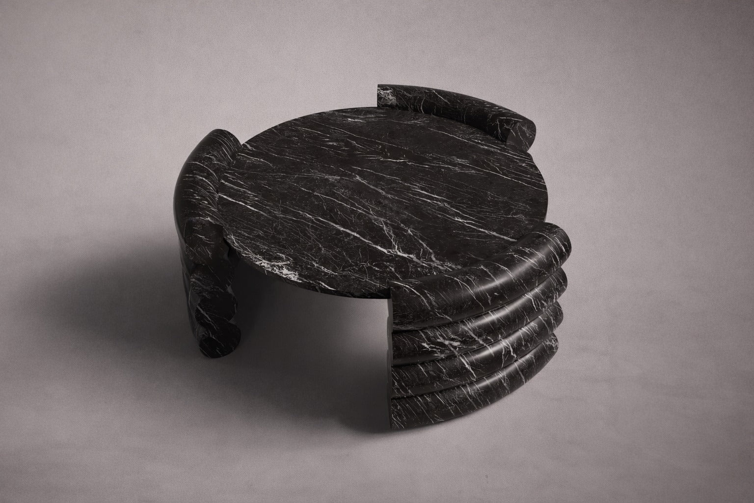 black marble coffee table. round black marble coffee table. marble coffee table. black marble center table. round black marble center table.