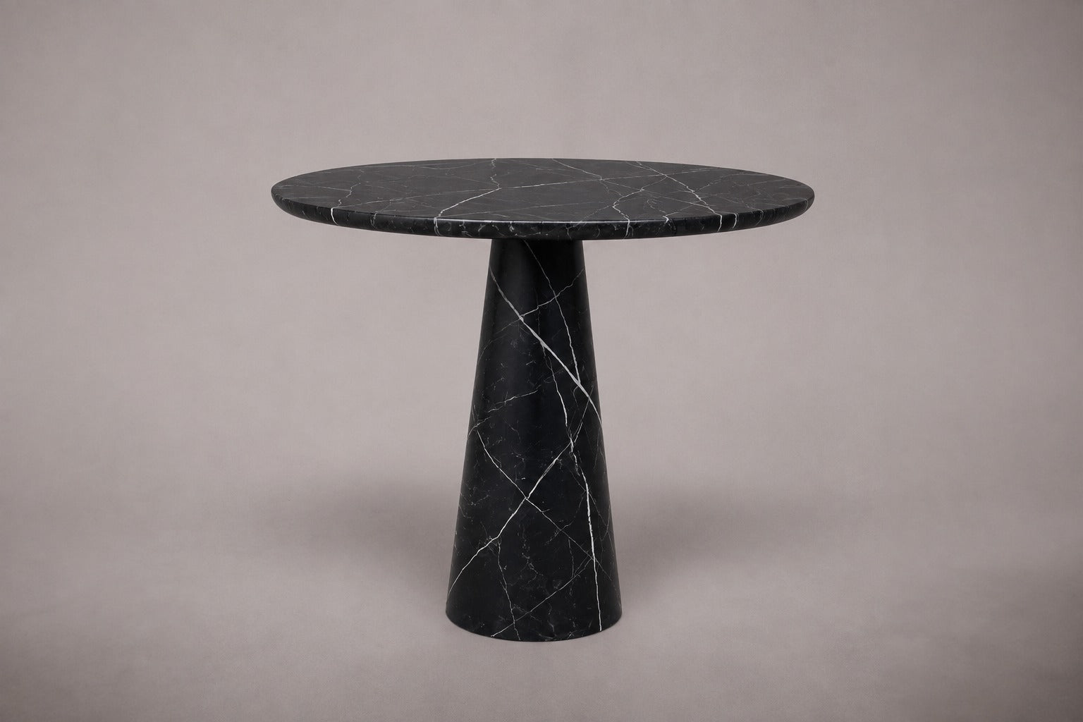 black marble dining table. black marble round dining table. round marble dining table. black marble table. black marble living room table. black marble entryway table. black marble entry table. round black marble entry table.