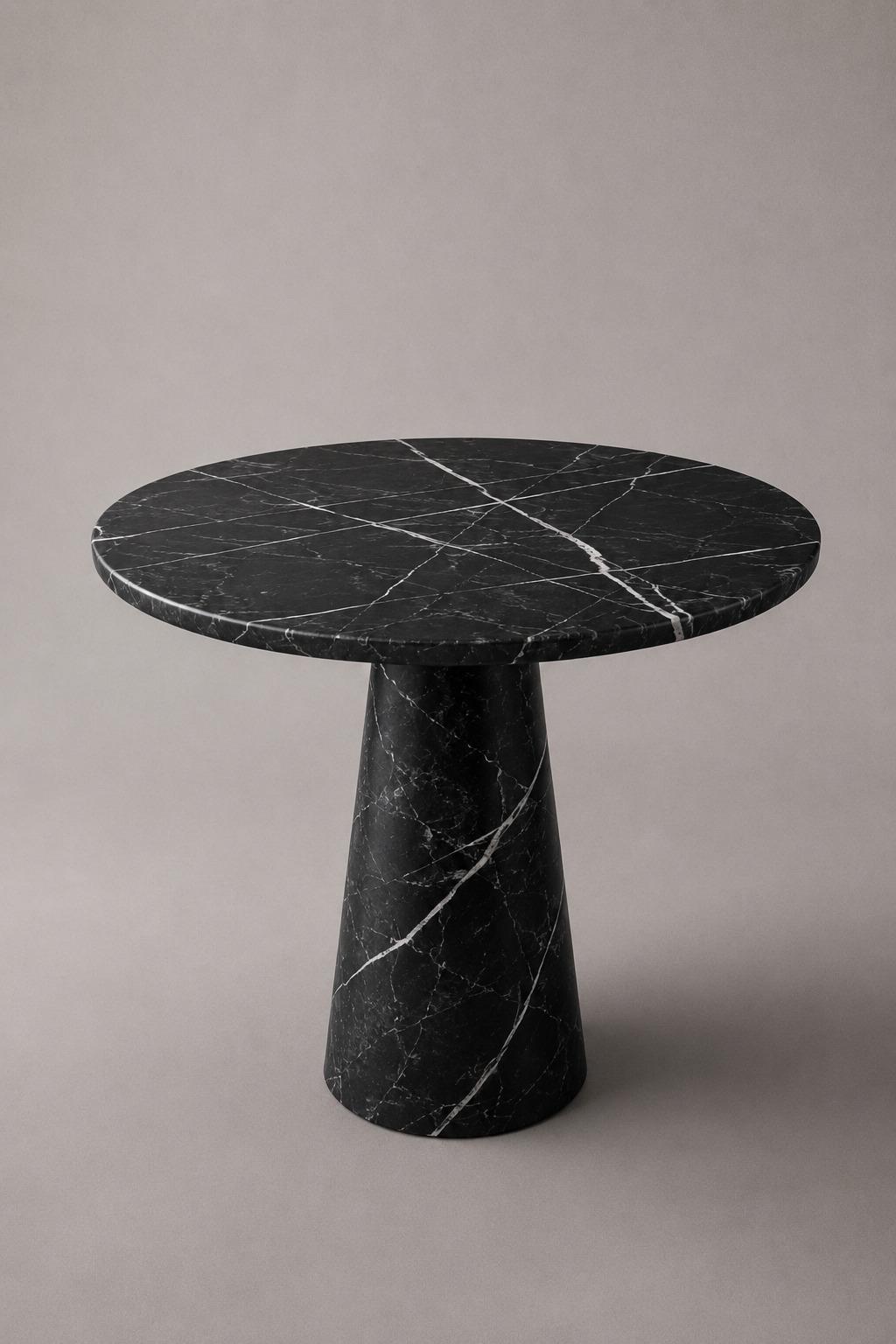 black marble dining table. black marble round dining table. round marble dining table. black marble table. black marble living room table. black marble entryway table. black marble entry table. round black marble entry table.