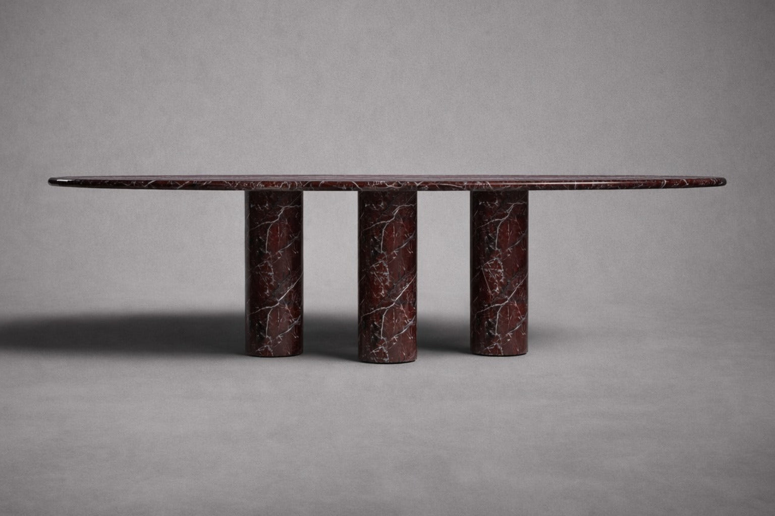 red marble dining table. oval red marble dining table. red marble table. large marble dining table. red marble living room table. red marble large dining table. custom marble dining table. custom marble table.