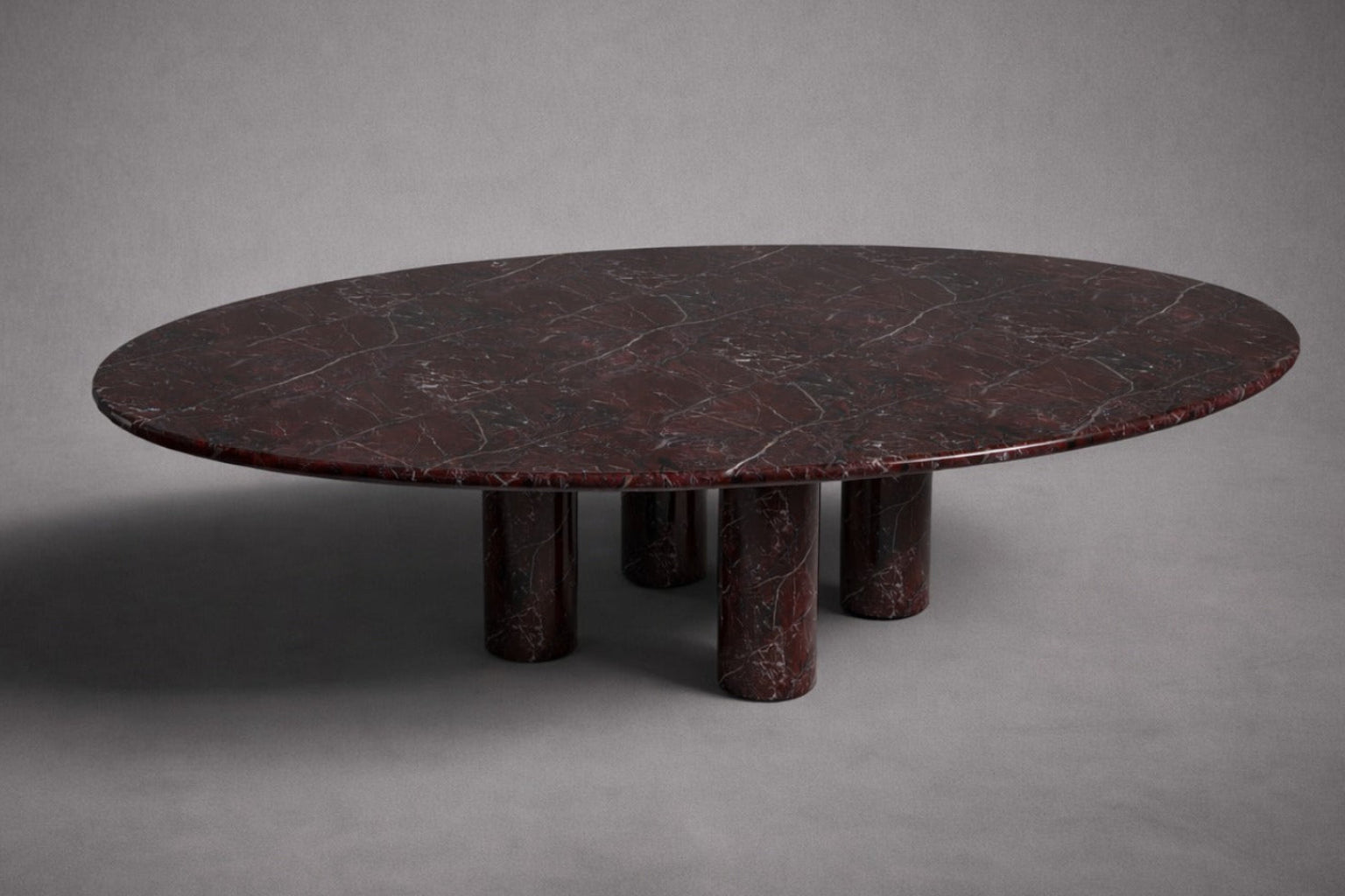 red marble dining table. oval red marble dining table. red marble table. large marble dining table. red marble living room table. red marble large dining table. custom marble dining table. custom marble table.