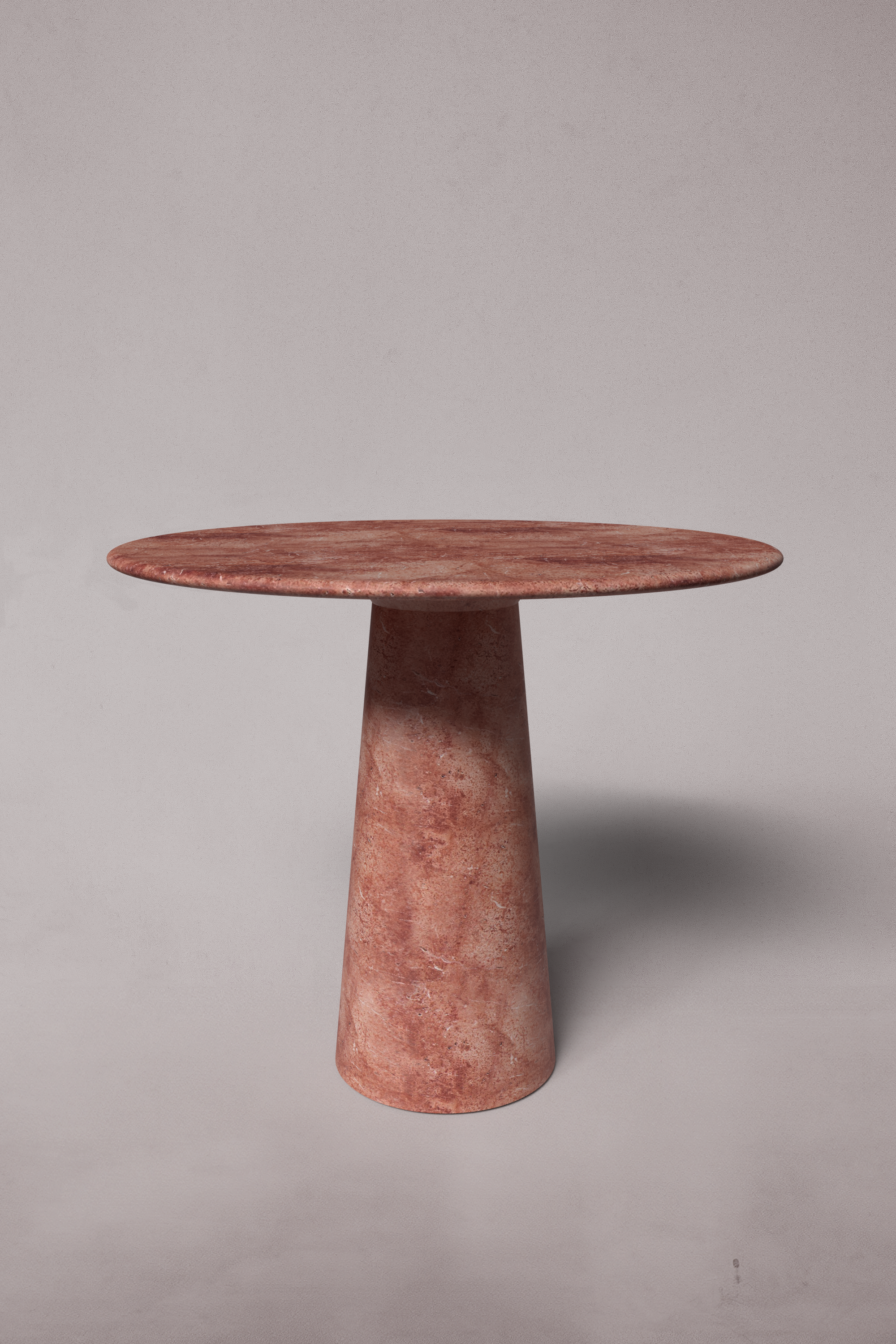 Le Cou Red Travertine Round Table