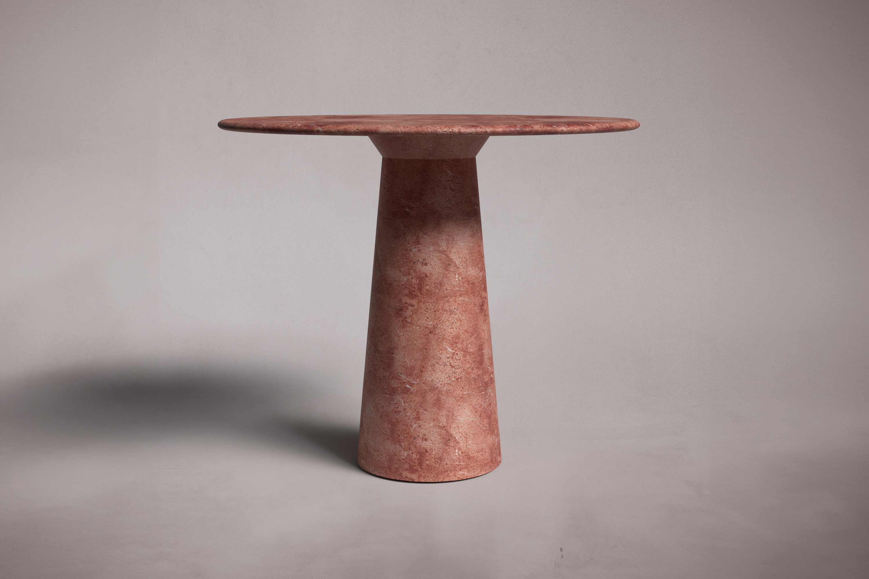 Le Cou Red Travertine Round Table