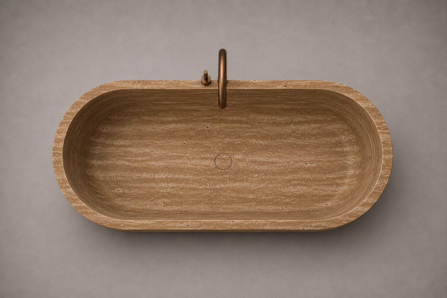 freestanding noche travertine bathtub in honed natural stone with sculptural oval silhouette. Freestanding noche travertine bathtub in warm beige natural stone. Custom noche travertine bathtub handcrafted from natural stone. Luxury natural stone bathtub with minimalist oval form. Handcrafted noche travertine bathtub for luxury bathroom design. Bespoke freestanding noche travertine bathtub for interior design projects. Custom luxury noche travertine bathtub for high end interior.