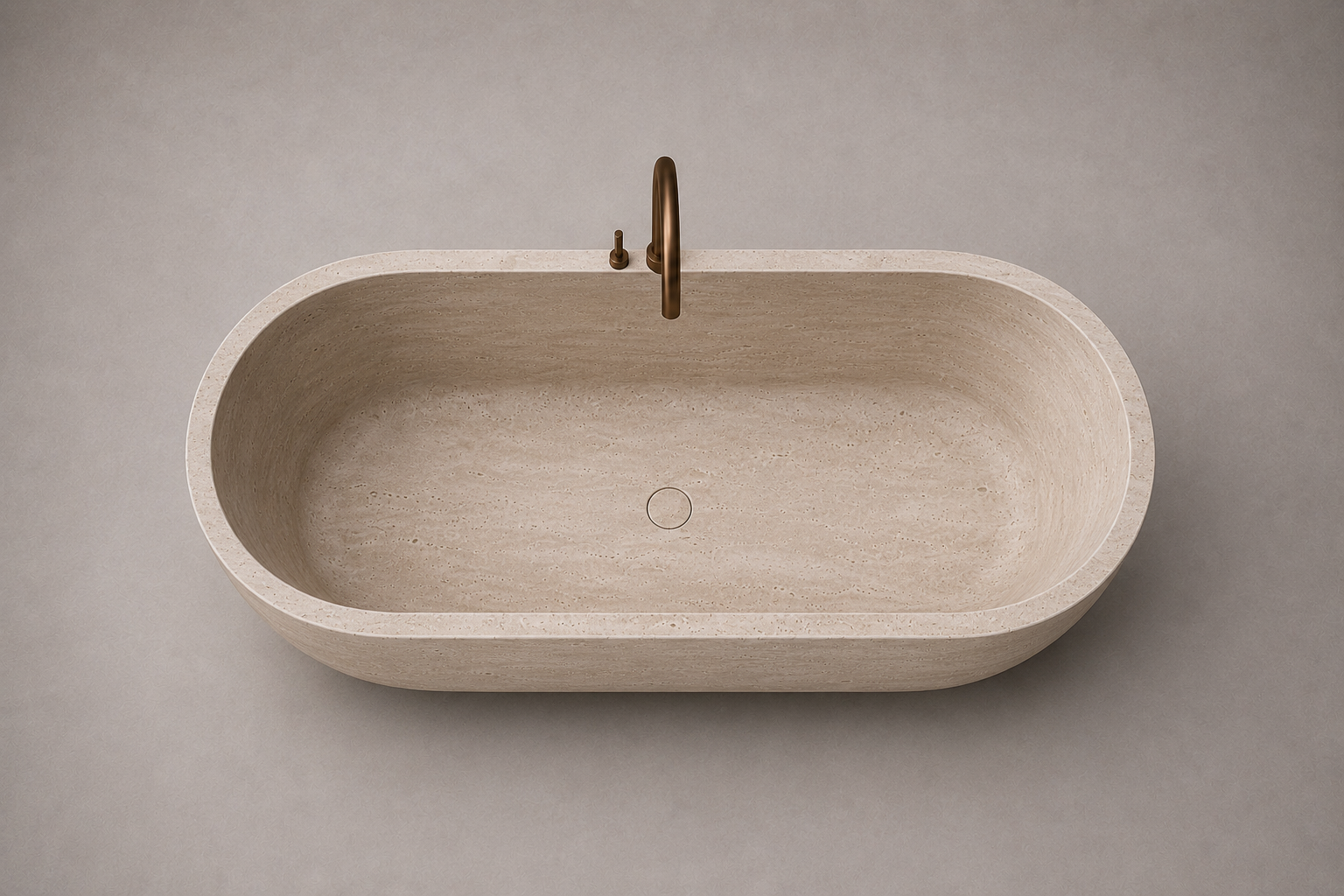 freestanding travertine bathtub in honed natural stone with sculptural oval silhouette. Freestanding travertine bathtub in warm beige natural stone. Custom travertine bathtub handcrafted from natural stone. Luxury natural stone bathtub with minimalist oval form. Handcrafted travertine bathtub for luxury bathroom design. Bespoke freestanding travertine bathtub for interior design projects. Natural stone freestanding bathtub in premium travertine finish. Custom luxury travertine bathtub for high end interior
