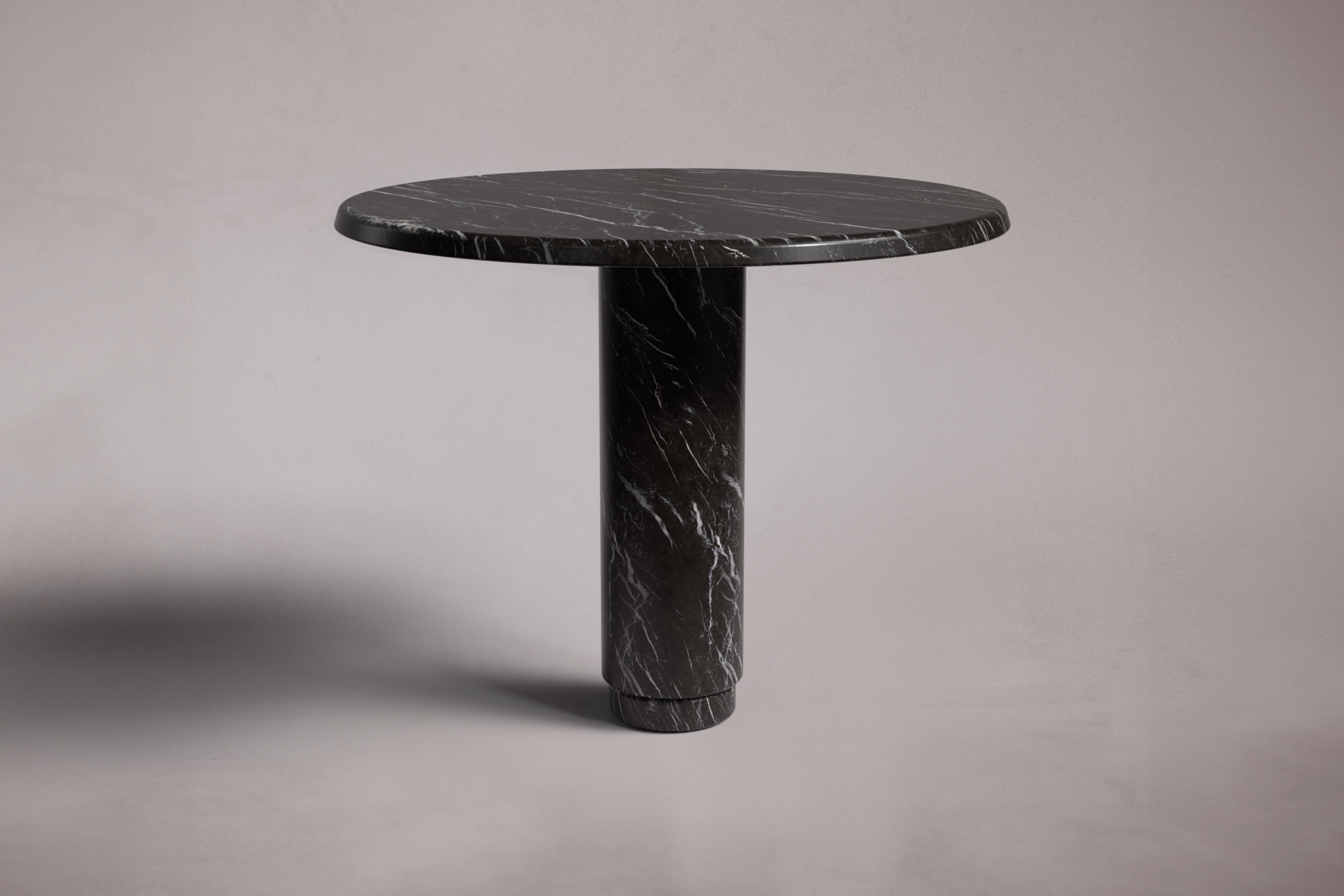 black marble dining table. black marble round dining table. round marble dining table. black marble table. black marble living room table. black marble entryway table. black marble entry table. round black marble entry table.