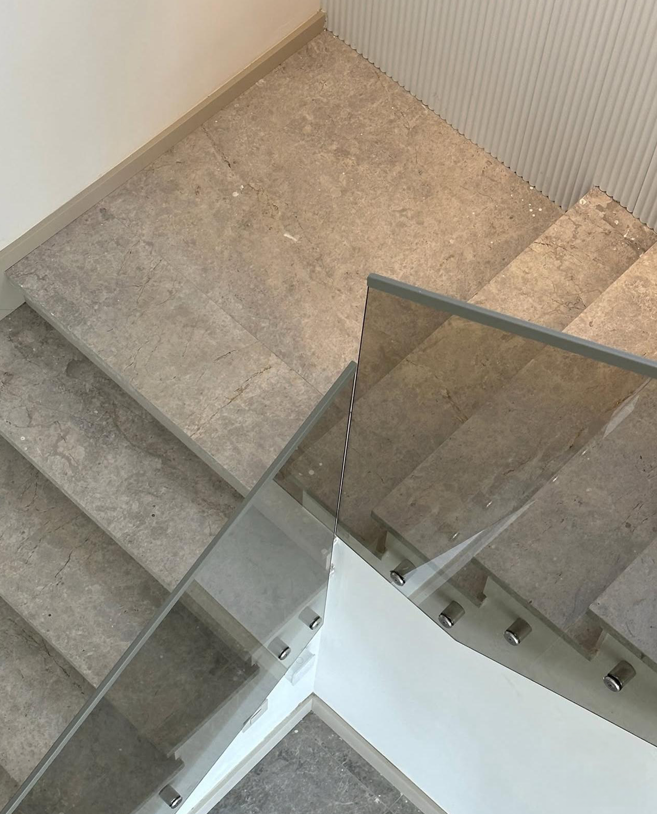 Our Custom Project For Interior Designer - Tundra Grey Marble – A Sophisticated Choice for Custom Staircase Cladding