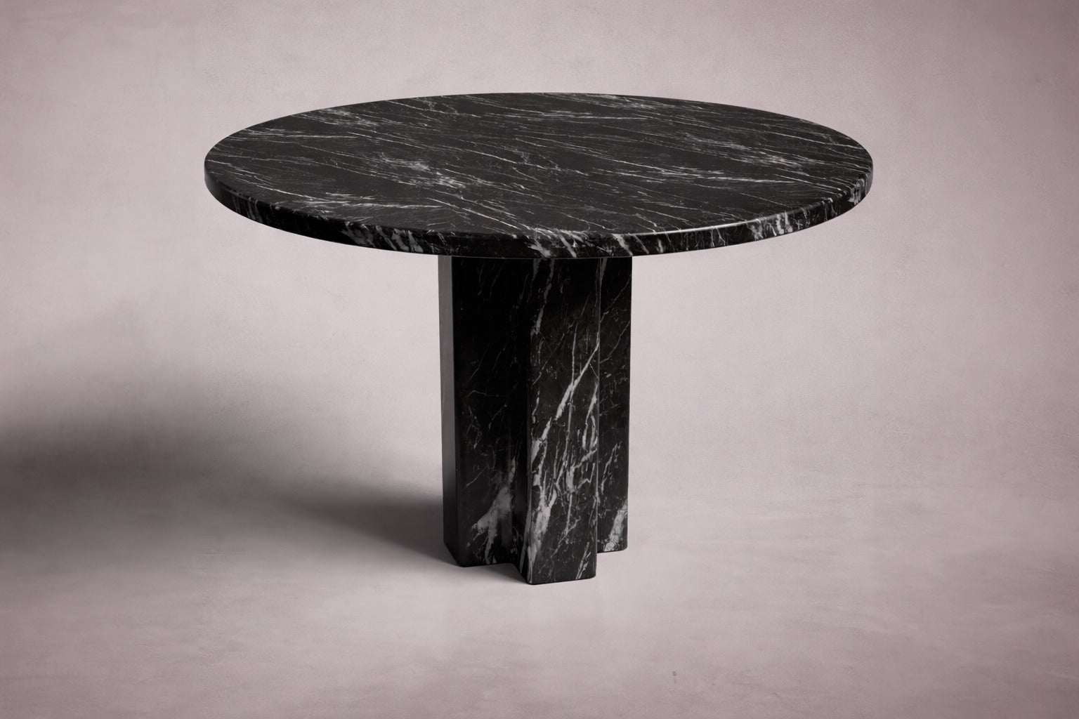black marble round table. round black marble dining table. black marble entry table. black marble round entry table. black marble hallway table. custom marble dining table. custom marble table. custom black marble dining table.