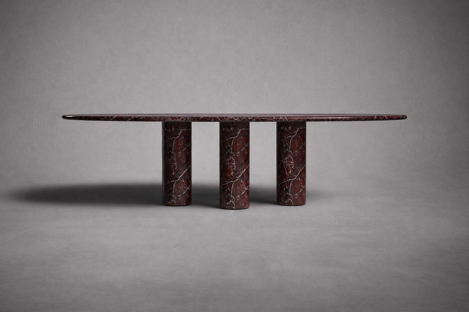 red marble dining table. oval red marble dining table. red marble table. large marble dining table. red marble living room table. red marble large dining table. custom marble dining table. custom marble table.