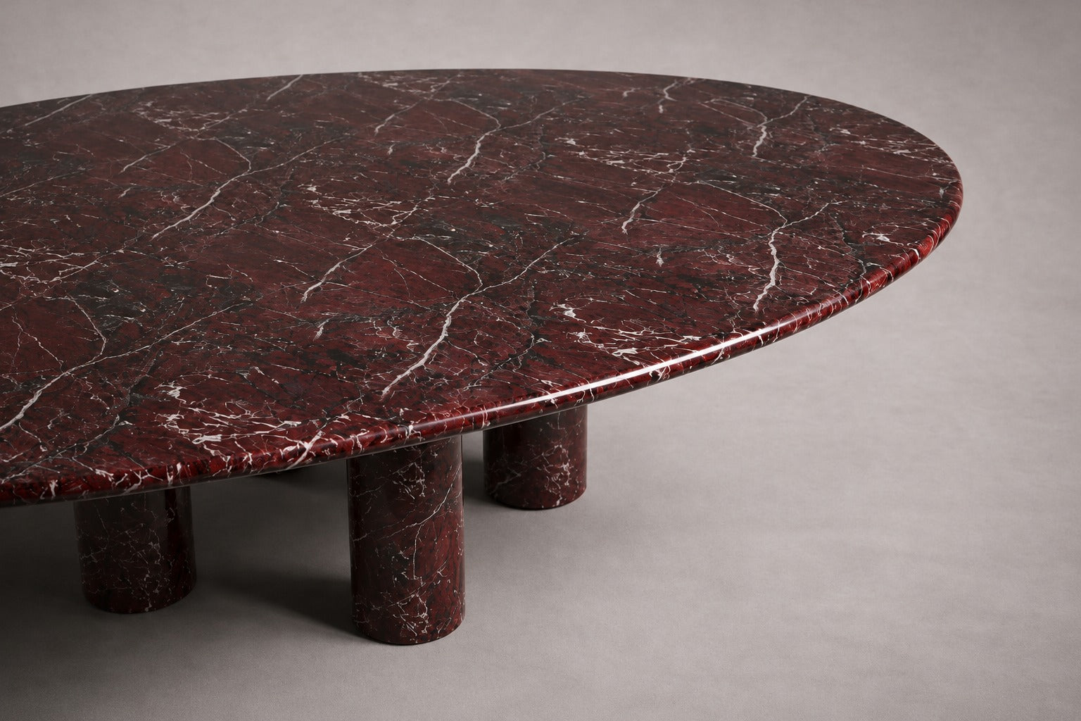 red marble dining table. oval red marble dining table. red marble table. large marble dining table. red marble living room table. red marble large dining table. custom marble dining table. custom marble table. solid red marble dining table.