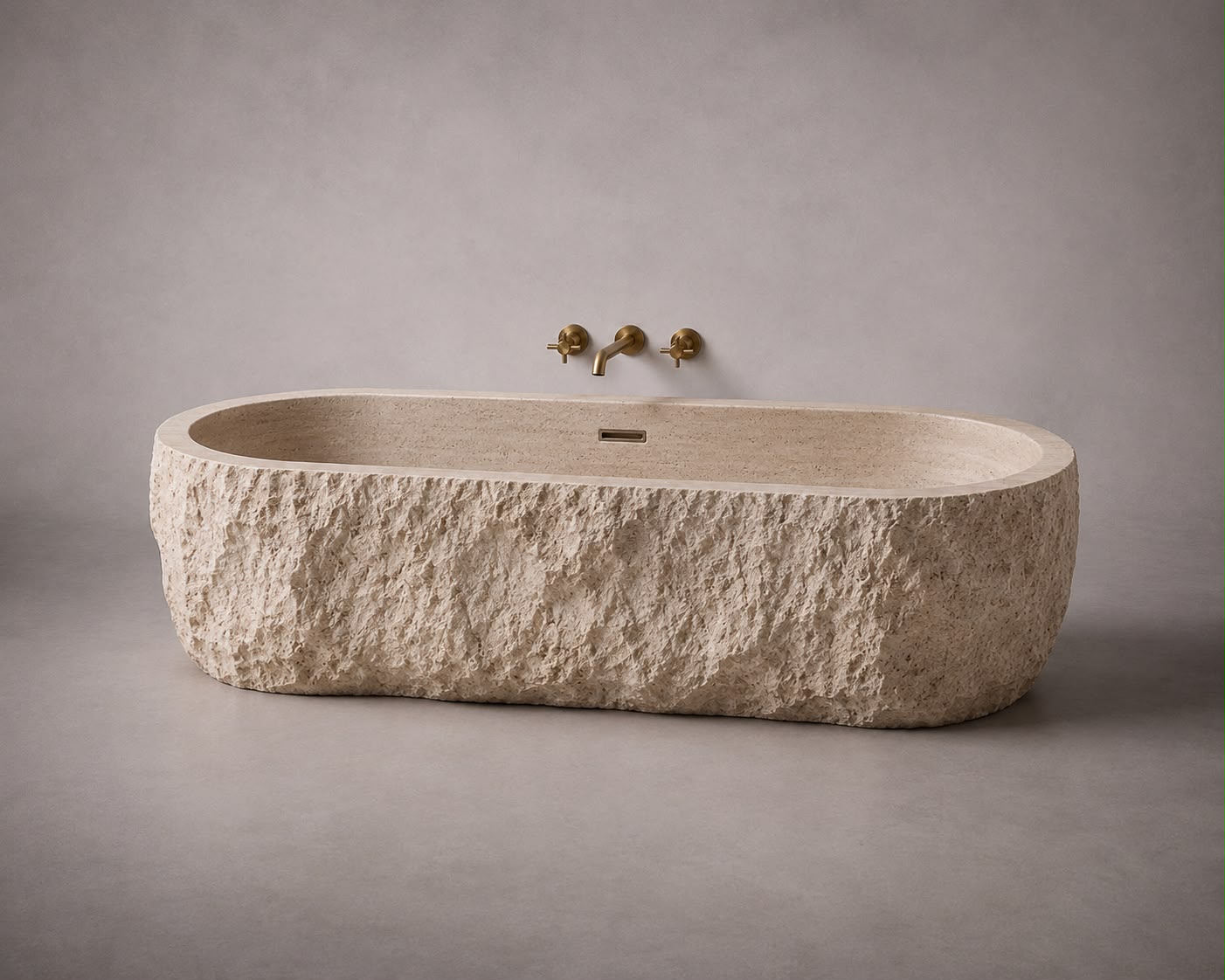 freestanding travertine bathtub in honed natural stone with sculptural oval silhouette. Freestanding travertine bathtub in warm beige natural stone. Custom travertine bathtub handcrafted from natural stone. Luxury natural stone bathtub with minimalist oval form. Handcrafted travertine bathtub for luxury bathroom design. Bespoke freestanding travertine bathtub for interior design projects. Natural stone freestanding bathtub in premium travertine finish. Custom luxury travertine bathtub for high end interior

