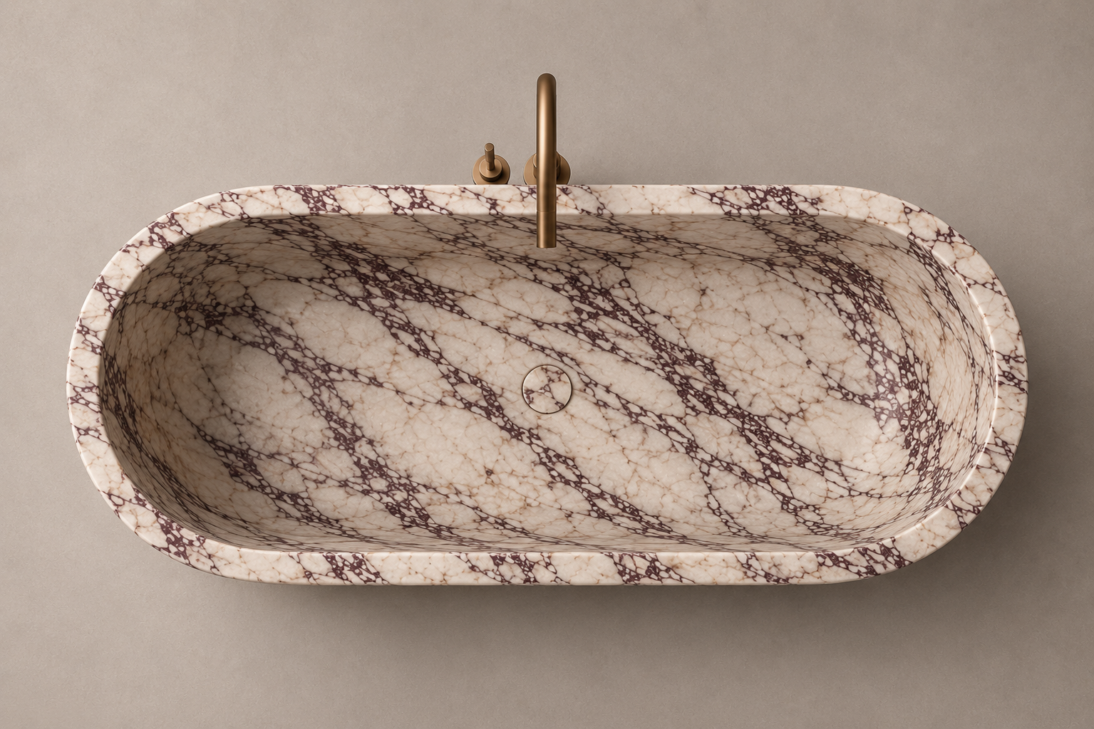 Freestanding marble bathtub with sculptural oval silhouette for luxury bathrooms. Custom marble bathtub in a refined freestanding design. Luxury freestanding marble bathtub handcrafted from natural stone. Bespoke marble bathtub with soft curved form for high end bathrooms. Custom freestanding marble bathtub for luxury interior design projects. Handcrafted marble bathtub with minimalist architectural silhouette

