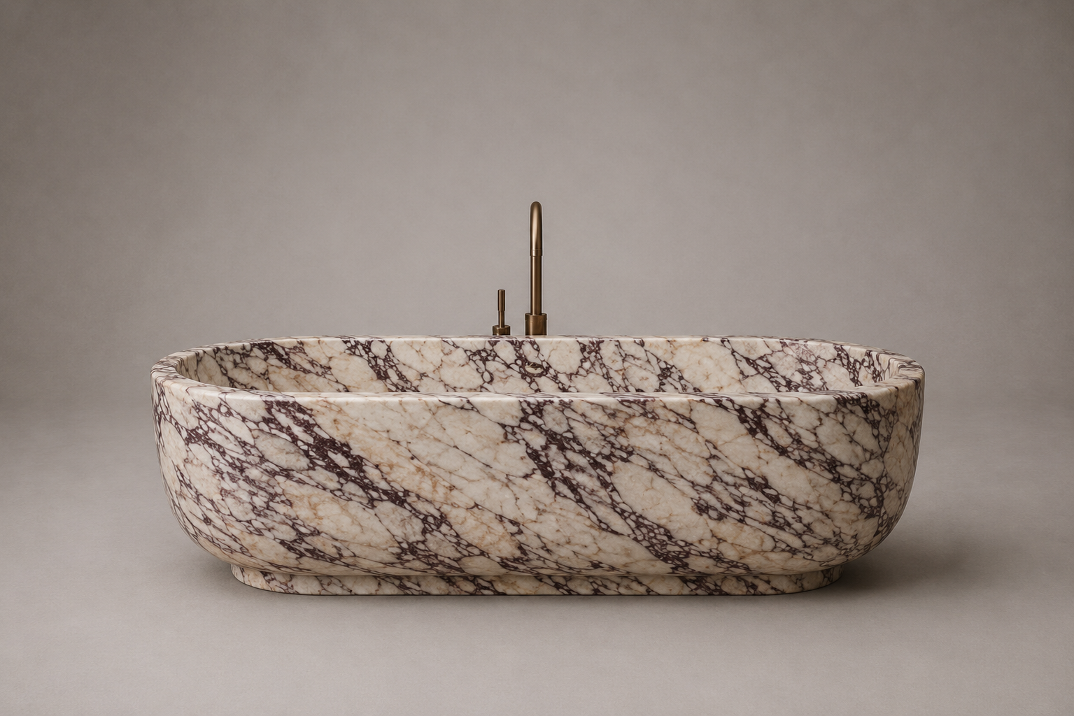 Freestanding marble bathtub with sculptural oval silhouette for luxury bathrooms. Custom marble bathtub in a refined freestanding design. Luxury freestanding marble bathtub handcrafted from natural stone. Bespoke marble bathtub with soft curved form for high end bathrooms. Custom freestanding marble bathtub for luxury interior design projects. Handcrafted marble bathtub with minimalist architectural silhouette

