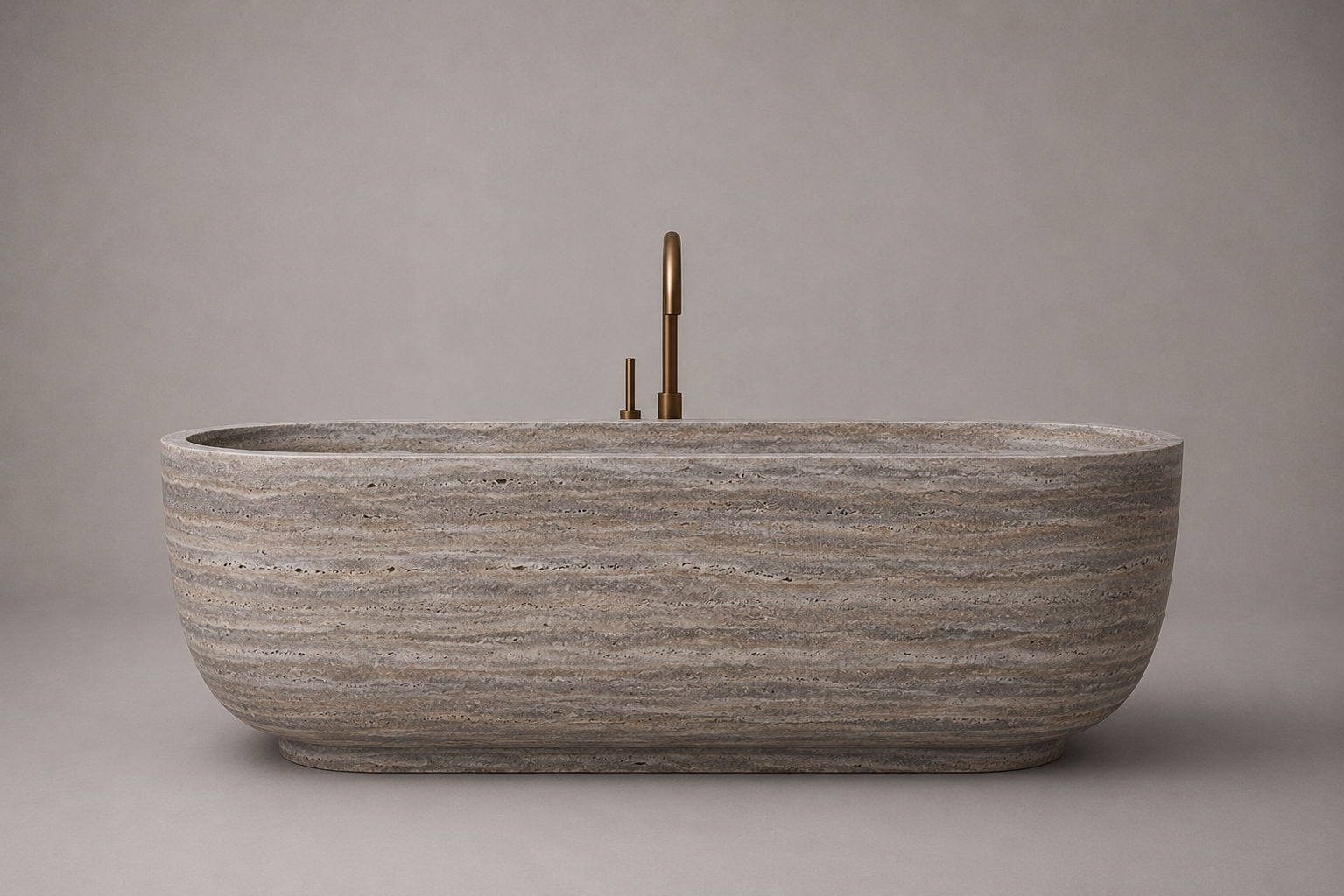 freestanding silver travertine bathtub in honed natural stone with sculptural oval silhouette. Freestanding silver travertine bathtub in warm beige natural stone. Custom silver travertine bathtub handcrafted from natural stone. Luxury natural stone bathtub with minimalist oval form. Handcrafted silver travertine bathtub for luxury bathroom design. Bespoke freestanding silver travertine bathtub for interior design projects. Custom luxury silver travertine bathtub for high end interior.
