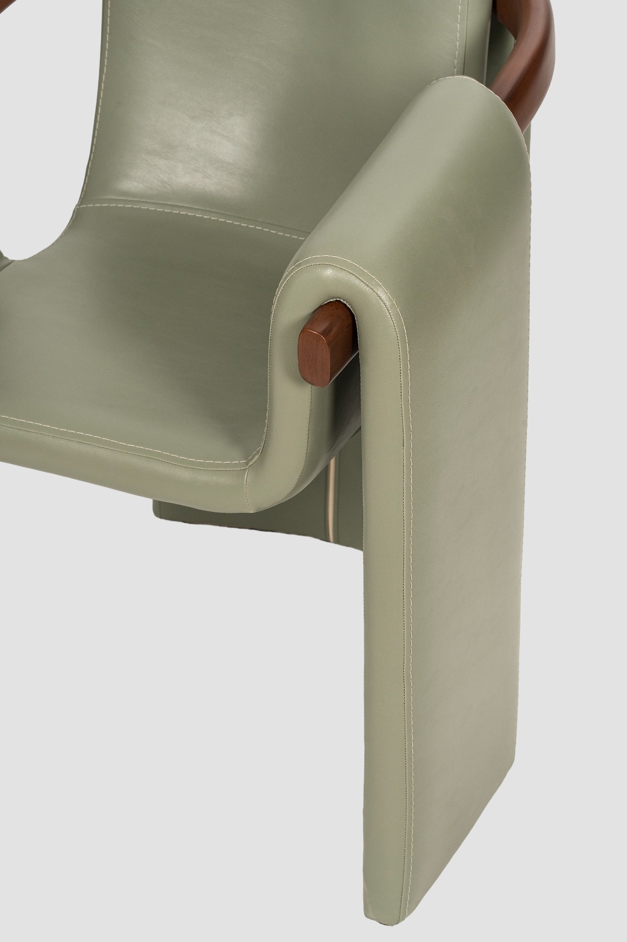 luxury leather dining chair. custom leather dining chair. modern leather dining chair. sculptural dining chair. designer dining chair. high end dining chair. contemporary leather armchair. bespoke dining chair. premium leather seating. architectural dining chair. burgundy leather dining chair. custom luxury leather dining chair USA. made to order leather dining chairs. modern sculptural leather arm dining chair. high end custom seating for interior designers. luxury restaurant leather dining chairs.