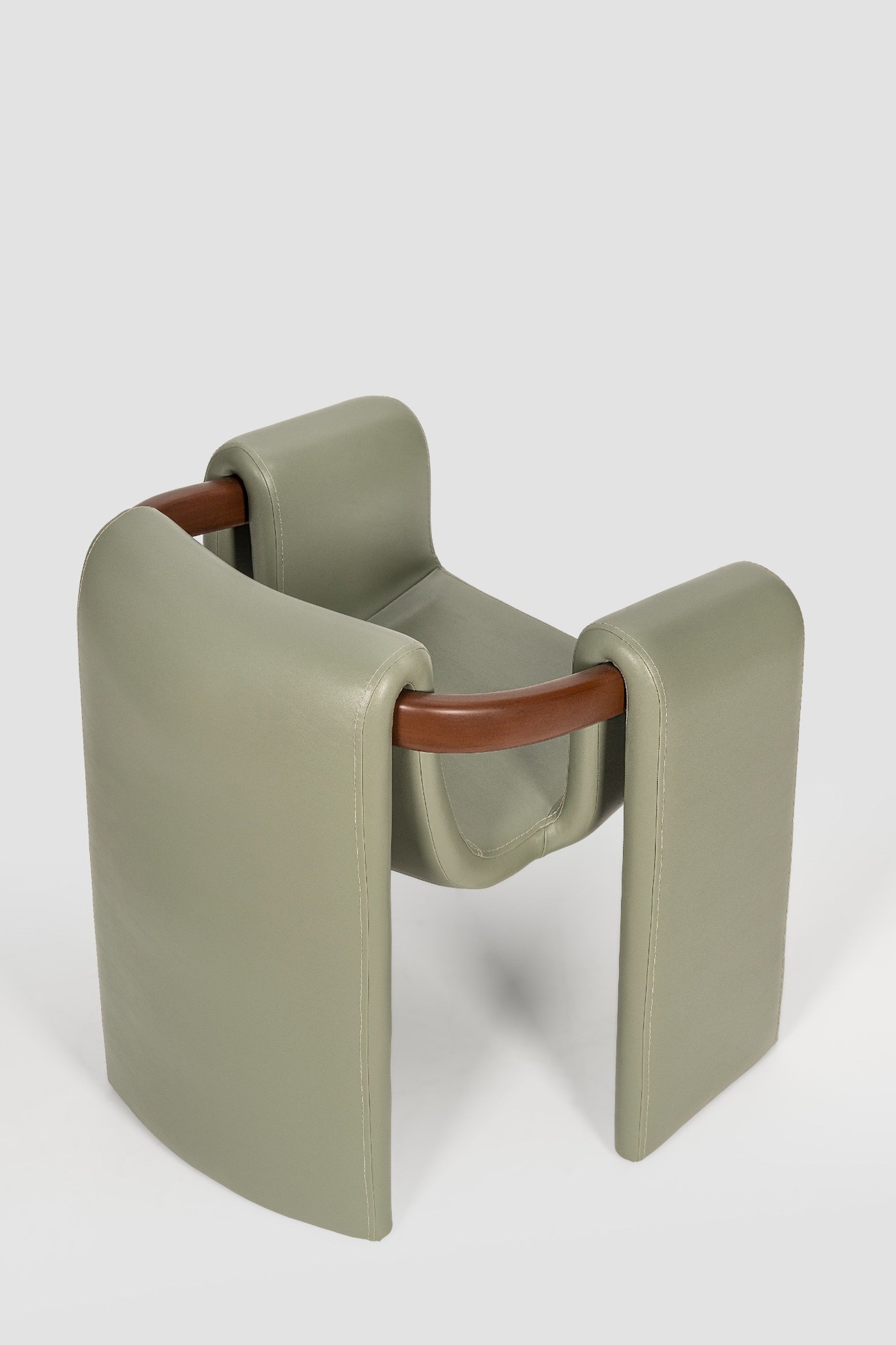 luxury leather dining chair. custom leather dining chair. modern leather dining chair. sculptural dining chair. designer dining chair. high end dining chair. contemporary leather armchair. bespoke dining chair. premium leather seating. architectural dining chair. burgundy leather dining chair. custom luxury leather dining chair USA. made to order leather dining chairs. modern sculptural leather arm dining chair. high end custom seating for interior designers. luxury restaurant leather dining chairs.