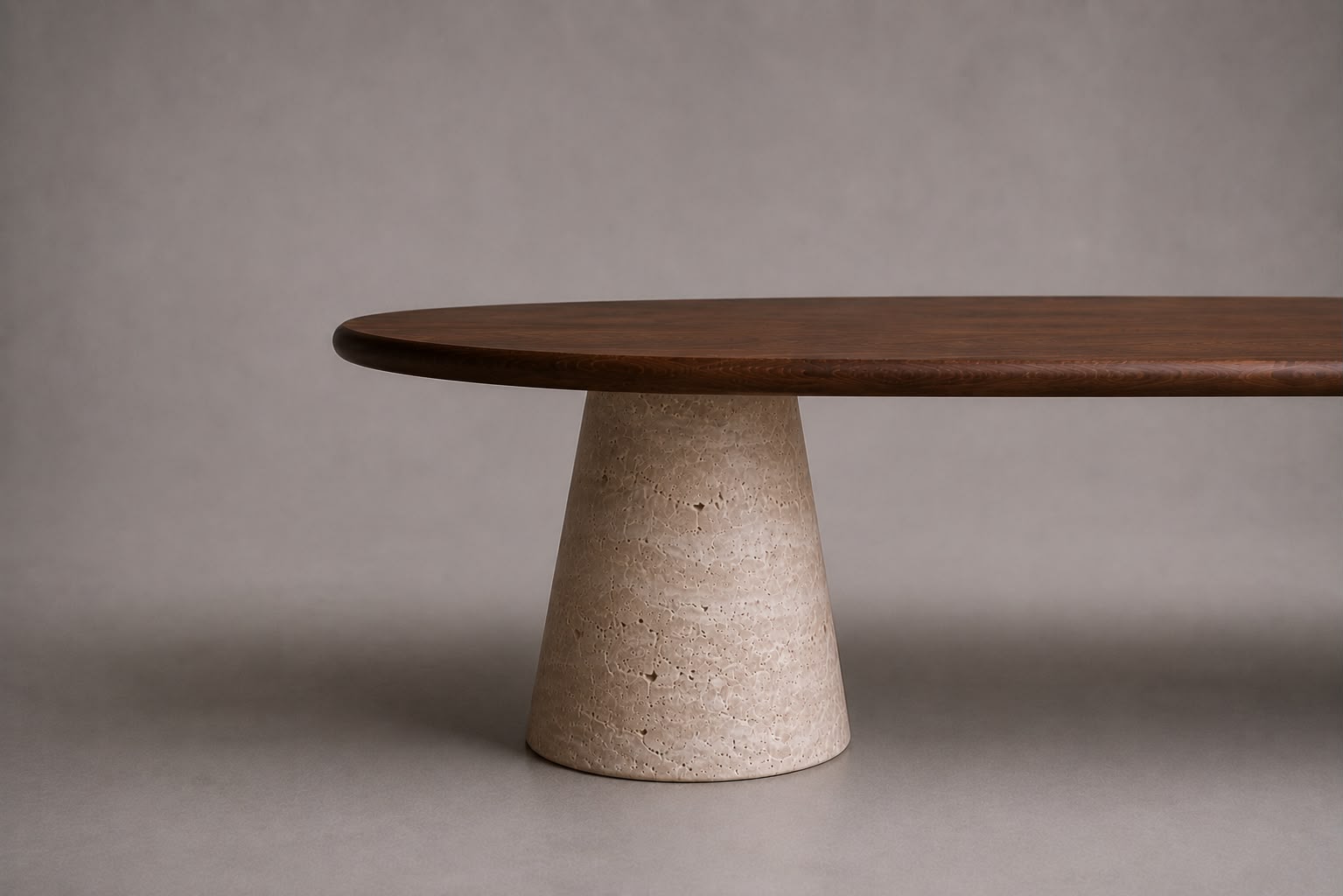 luxury wood oval dining table with walnut top and travertine base.walnut wood oval dining table with sculptural travertine legs. designer wood dining table with travertine supports. oval walnut dining table for luxury interiors. custom wood dining table with travertine legs. premium walnut dining table with natural stone base. architectural oval dining table in walnut wood and travertine. luxury walnut wood dining table for bespoke interiors. wood oval dining table with travertine pedestal supports. 
